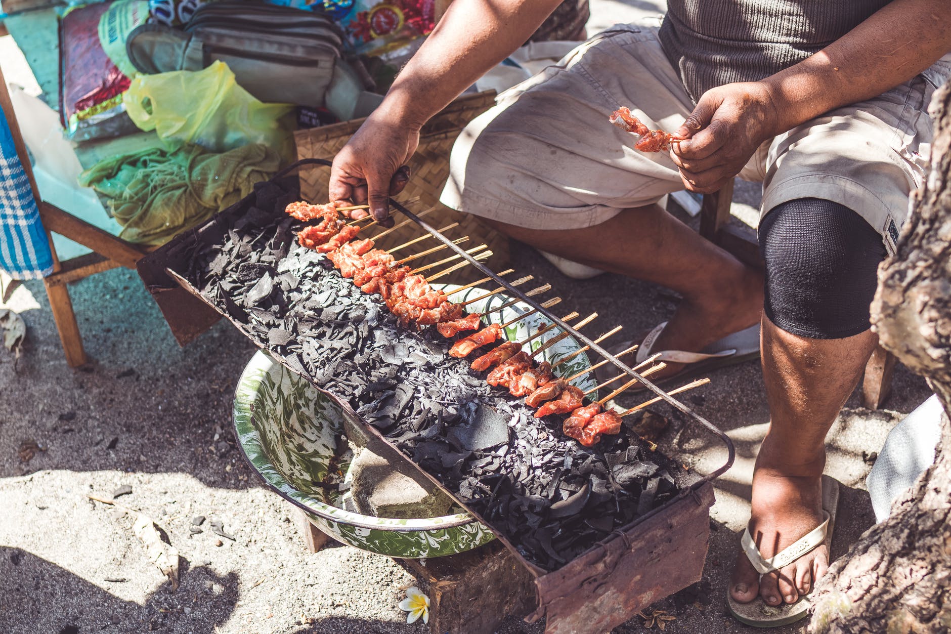 person cooking street food