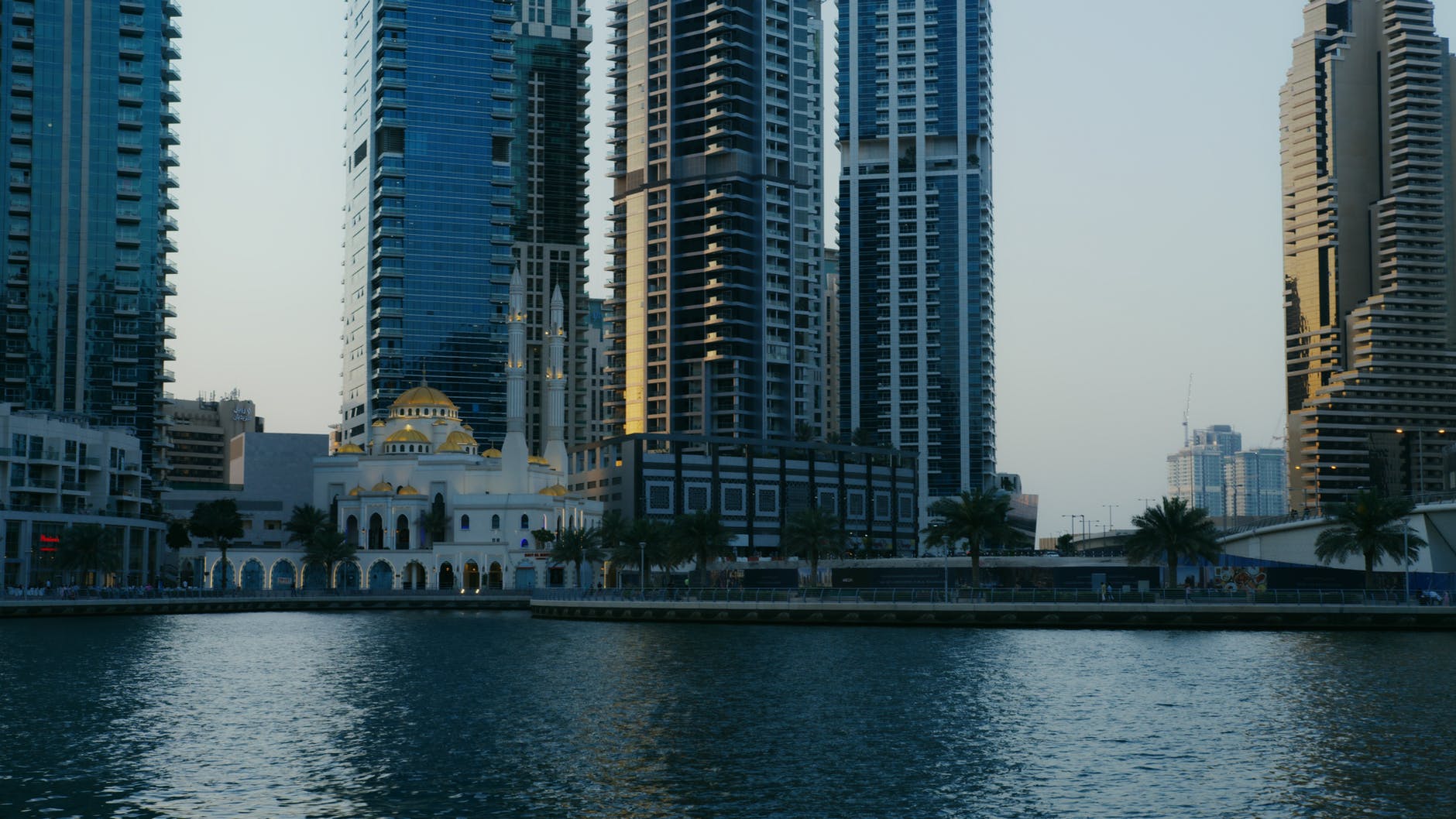 city skyline across body of water