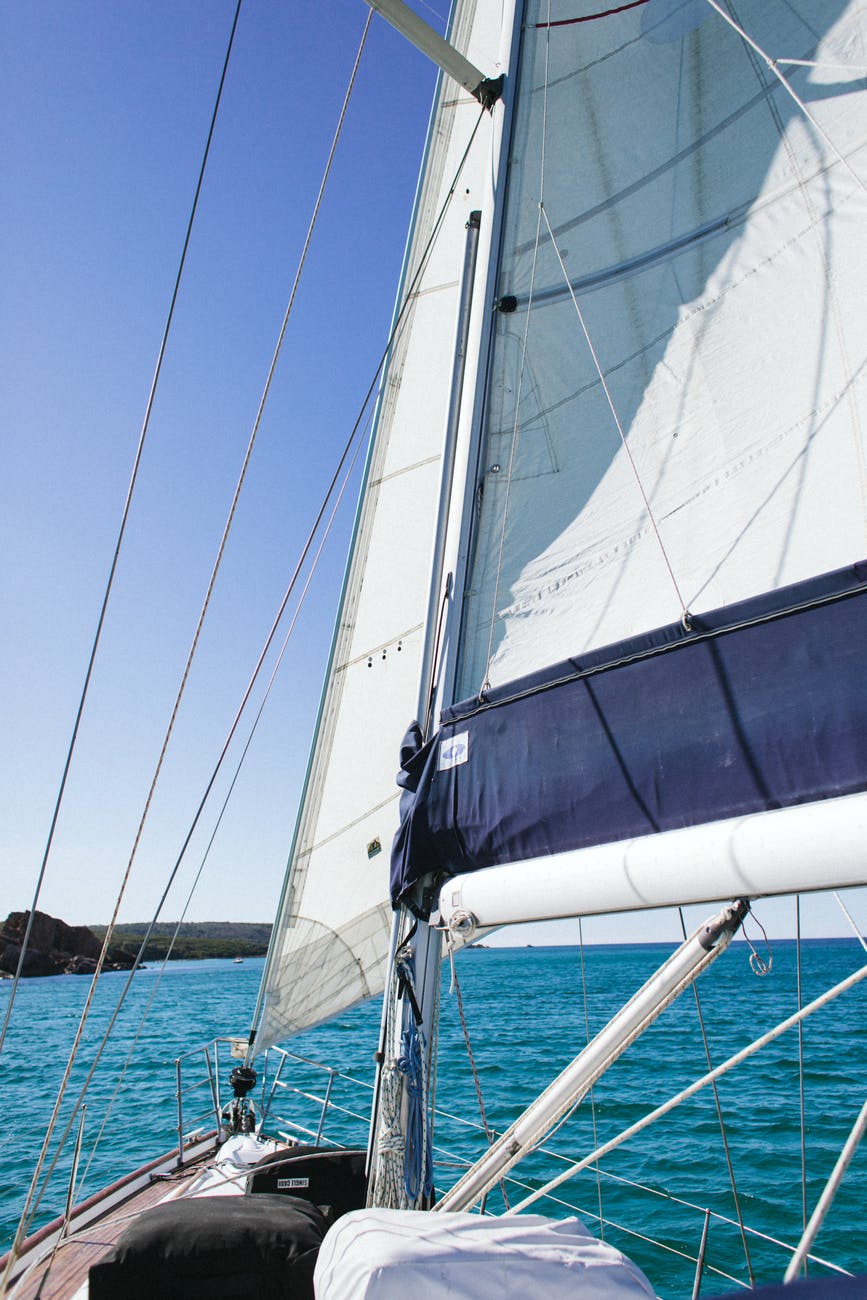 modern sailboat floating on blue water