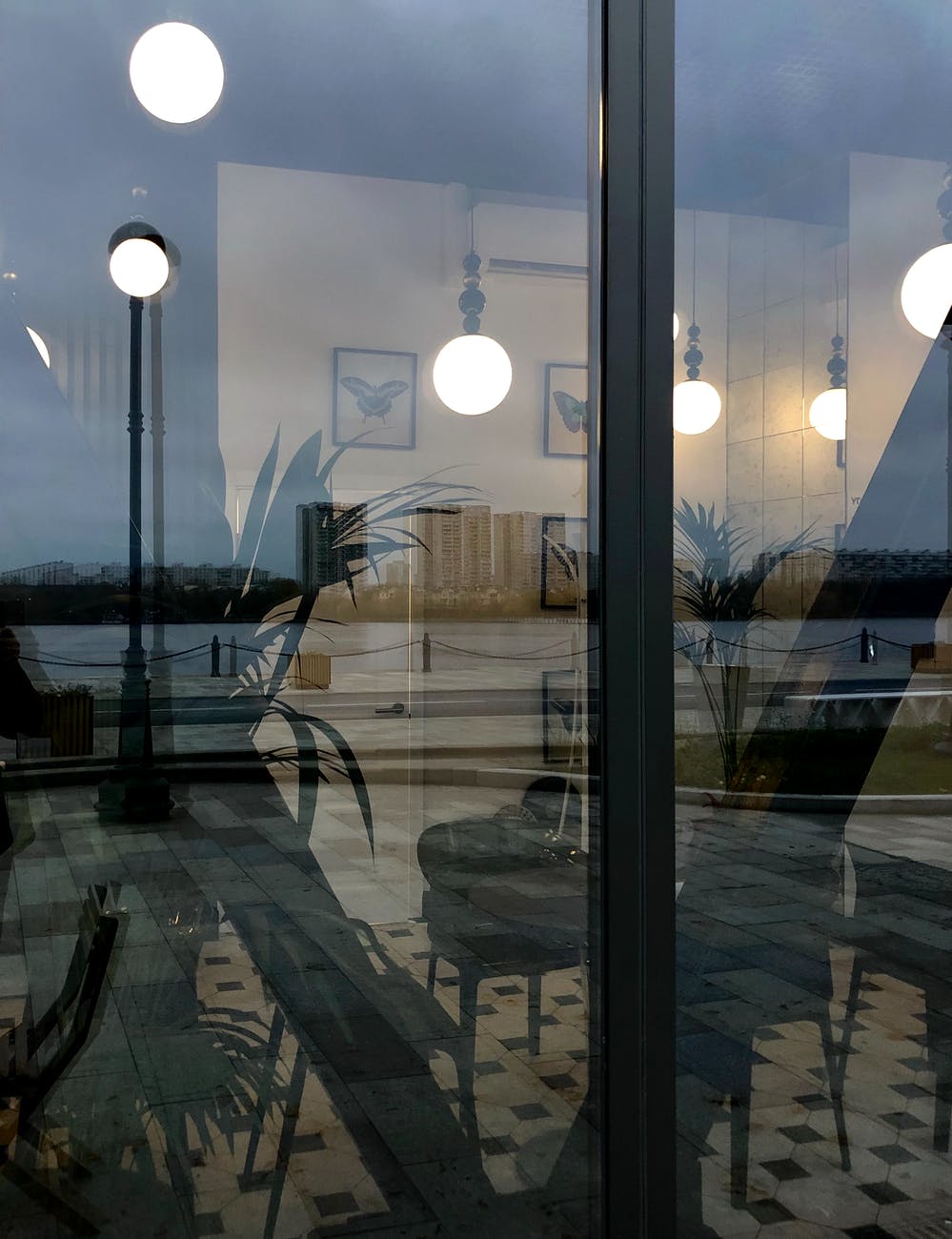 empty modern cafe interior with illuminated lamps