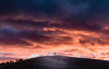 person on top of a hill